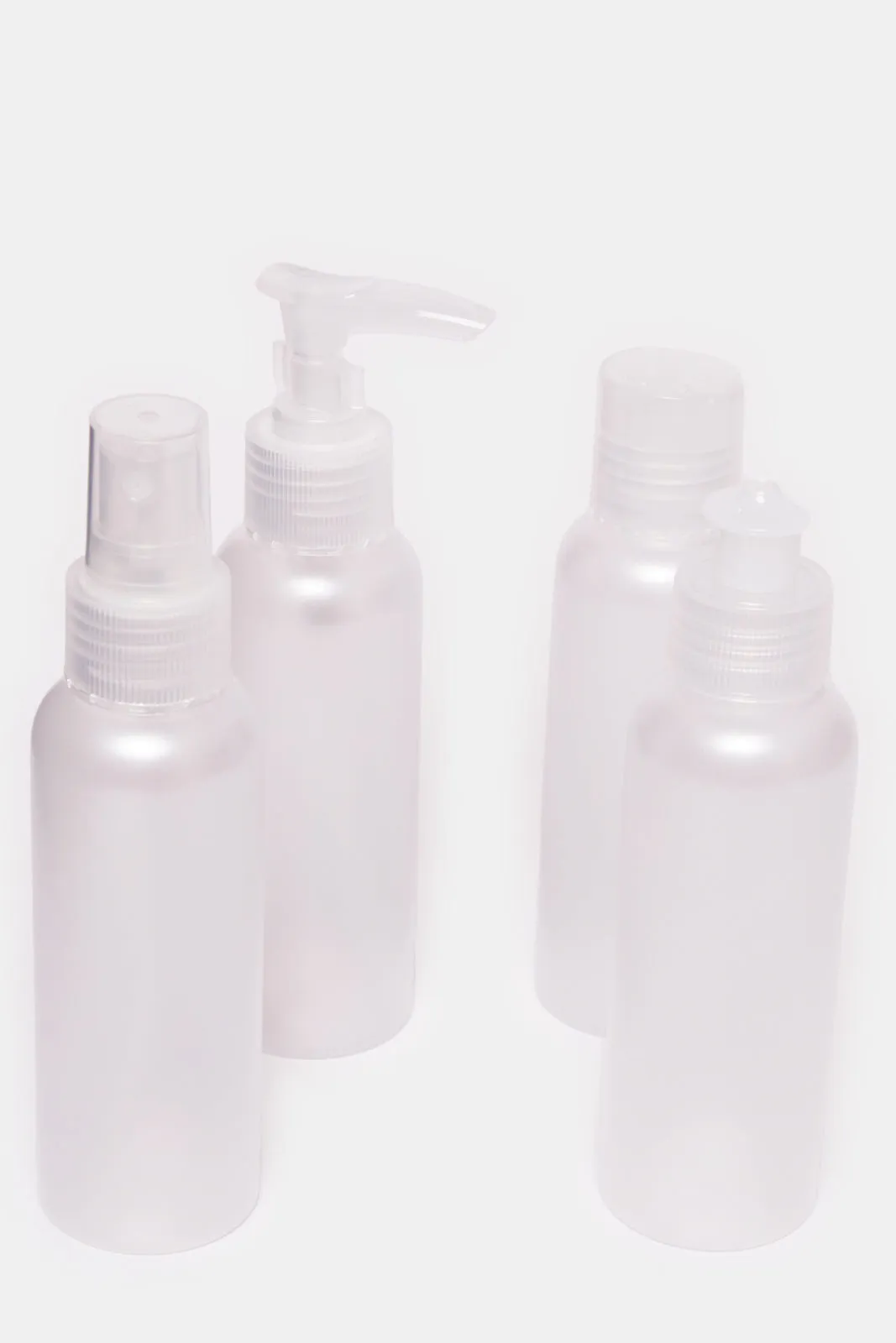 White Travel Bottle Set Of 4(Piece)