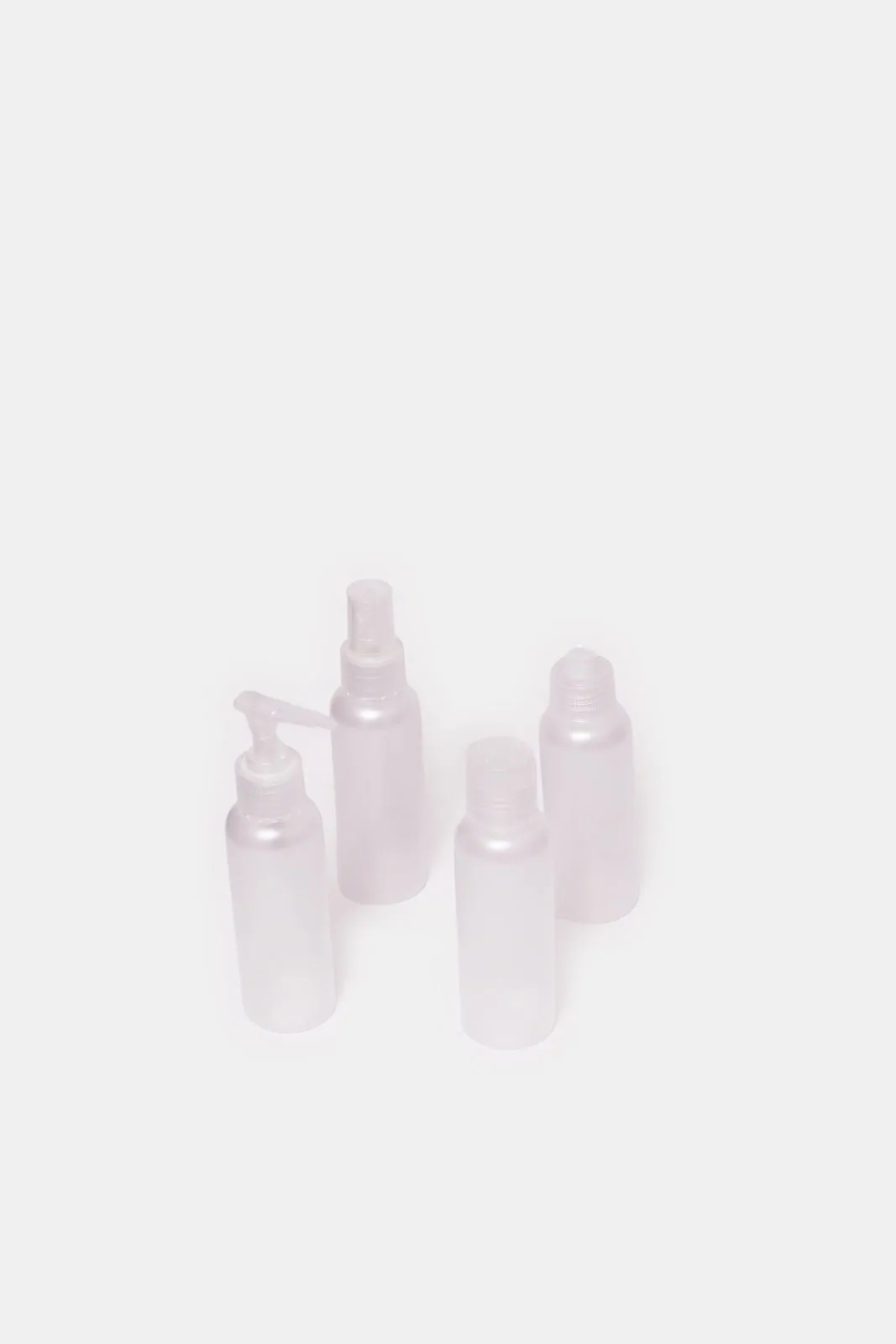 White Travel Bottle Set Of 4(Piece)